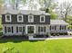 Charming two-story home with gray siding, dormer windows, and a manicured lawn at 5829 Lasalle St, Indianapolis, IN 46220