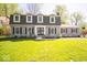 Charming two-story home featuring a well-manicured lawn and inviting front entrance at 5829 Lasalle St, Indianapolis, IN 46220