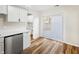 Stylish kitchen boasts stainless steel appliances and seamless access to the outdoor patio, perfect for dining at 6026 Oakbrook Ln, Indianapolis, IN 46254