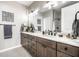 Modern bathroom with double vanity, marble countertops, and stylish fixtures, offering luxury and convenience at 624 E Walnut St # 46, Indianapolis, IN 46204