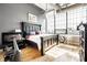 Modern bedroom featuring a king-size bed, large windows, and contemporary decor for a comfortable retreat at 624 E Walnut St # 46, Indianapolis, IN 46204