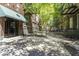 Inviting entryway with shaded canopy, glass door, and access to common areas at 624 E Walnut St # 46, Indianapolis, IN 46204