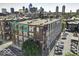 Brick building exterior with downtown skyline view; large windows provide ample natural light at 624 E Walnut St # 46, Indianapolis, IN 46204