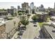 Charming street scene with a blend of residential and commercial buildings, lined with trees at 624 E Walnut St # 46, Indianapolis, IN 46204