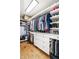 Spacious walk-in closet features custom shelving and ample storage for organization and convenience at 624 E Walnut St # 46, Indianapolis, IN 46204
