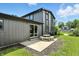 Siding house with a concrete patio featuring a picnic table in the spacious backyard at 660 Sun Valley Ct, Indianapolis, IN 46217