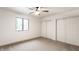 Bright bedroom with a large window, ceiling fan and closet with slider doors at 660 Sun Valley Ct, Indianapolis, IN 46217