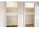 View of walk-in closets featuring installed shelving at 660 Sun Valley Ct, Indianapolis, IN 46217