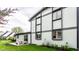 A bright and spacious exterior with a patio area and an outdoor concrete table and chairs at 660 Sun Valley Ct, Indianapolis, IN 46217