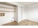 Laundry room with wooden shelving and utility connections at 660 Sun Valley Ct, Indianapolis, IN 46217
