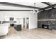 Bright and spacious living space featuring a fireplace and kitchen at 660 Sun Valley Ct, Indianapolis, IN 46217