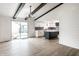 Open living space with a dining area, kitchen, and sliding doors to the backyard at 660 Sun Valley Ct, Indianapolis, IN 46217