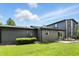 Siding house with a concrete patio featuring a picnic table, and a spacious backyard at 660 Sun Valley Ct, Indianapolis, IN 46217