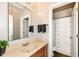 Bathroom with a sink, a large mirror and shower featuring a patterned shower curtain at 6625 W Winding Bnd, McCordsville, IN 46055