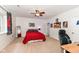 Spacious bedroom with themed decor, a ceiling fan, and plush carpeting at 6625 W Winding Bnd, McCordsville, IN 46055