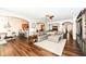Spacious living area with an open concept layout and hardwood floors at 6625 W Winding Bnd, McCordsville, IN 46055