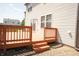 An inviting back deck offers a relaxing outdoor space for entertaining or enjoying quiet moments at 6725 Tramcus Dr, Indianapolis, IN 46260