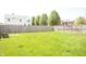 The spacious, grassy backyard is perfect for recreation and enjoying the outdoors at 6725 Tramcus Dr, Indianapolis, IN 46260