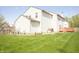 A sprawling backyard with a deck offers ample space for outdoor living and entertainment at 6725 Tramcus Dr, Indianapolis, IN 46260