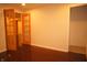 Finished basement featuring hardwood flooring, French doors, and recessed lighting at 6725 Tramcus Dr, Indianapolis, IN 46260