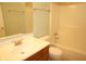 Bathroom featuring a white vanity sink, toilet and shower with neutral walls at 6725 Tramcus Dr, Indianapolis, IN 46260