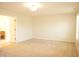 Spacious bedroom with ample natural light from windows, and door to Primary bath at 6725 Tramcus Dr, Indianapolis, IN 46260