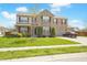 This charming two-story home features brick accents, manicured landscaping, and a convenient two-car garage at 6725 Tramcus Dr, Indianapolis, IN 46260