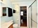 Charming bathroom with a shower, wood vanity, and tile flooring at 921 Kimberly Ave, Westfield, IN 46074