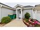 This property features a covered entryway and a small garden with privacy fence at 921 Kimberly Ave, Westfield, IN 46074