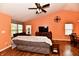 Cozy living room featuring vaulted ceilings, wood floors, and ample natural light at 921 Kimberly Ave, Westfield, IN 46074