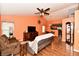 Open concept living area with a view into the kitchen and dining space, featuring wood floors at 921 Kimberly Ave, Westfield, IN 46074