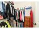 Walk-in closet features shelving and clothes racks for optimal storage at 921 Kimberly Ave, Westfield, IN 46074