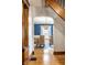 Open dining room with hardwood floors, view of a dining table, and natural light streaming in at 1044 E Garfield Dr, Indianapolis, IN 46203
