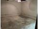 Unfinished basement with painted brick walls, showing some exposed electrical wiring at 10770 W 650 S, Columbus, IN 47201