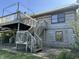 View of log cabin showing deck access, steps, windows and gutters at 10770 W 650 S, Columbus, IN 47201