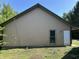 Rear exterior view of garage with metal roof and siding at 10770 W 650 S, Columbus, IN 47201
