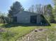 View of an outbuilding featuring a large opening and a storage space at 10770 W 650 S, Columbus, IN 47201