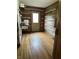 Functional utility room featuring wood-paneled walls and ample space at 10770 W 650 S, Columbus, IN 47201