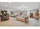 A large bedroom featuring a daybed, decor, and ceiling fan at 11341 Abercairn Ct, Zionsville, IN 46077