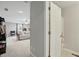 A bedroom viewed from the hallway with a daybed and ceiling fan at 11341 Abercairn Ct, Zionsville, IN 46077