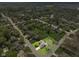 Stunning aerial view of a home nestled in a lush, established neighborhood with mature trees at 1170 Runningbrook Dr, Avon, IN 46123
