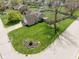 Aerial view of a well-maintained home with a lush front yard and inviting curb appeal in a quiet neighborhood at 1170 Runningbrook Dr, Avon, IN 46123