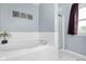 Bathroom featuring a relaxing soaking tub and separate shower at 1170 Runningbrook Dr, Avon, IN 46123
