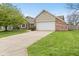 Attractive single-story home featuring brick and siding exterior, attached garage, and neatly maintained landscaping at 1170 Runningbrook Dr, Avon, IN 46123