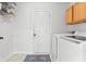 Functional laundry room equipped with washer, dryer, and storage space, perfect for everyday convenience at 1170 Runningbrook Dr, Avon, IN 46123
