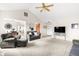 Bright living room with comfortable sofas and a view of the dining area, great for entertaining at 1170 Runningbrook Dr, Avon, IN 46123