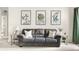 Living room couch with stylish decor and side tables, perfect for relaxing or entertaining guests at 1170 Runningbrook Dr, Avon, IN 46123