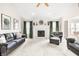 Spacious living room featuring a fireplace, high ceilings, and comfortable seating arrangement at 1170 Runningbrook Dr, Avon, IN 46123
