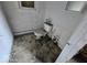 Bathroom needing renovation with toilet and peeling paint at 124 N Grant Ave, Indianapolis, IN 46201