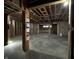 Spacious basement shows stud framing, open ceiling with HVAC, and concrete floor during a construction phase at 1509 Chatham Rdg Ct, Westfield, IN 46074